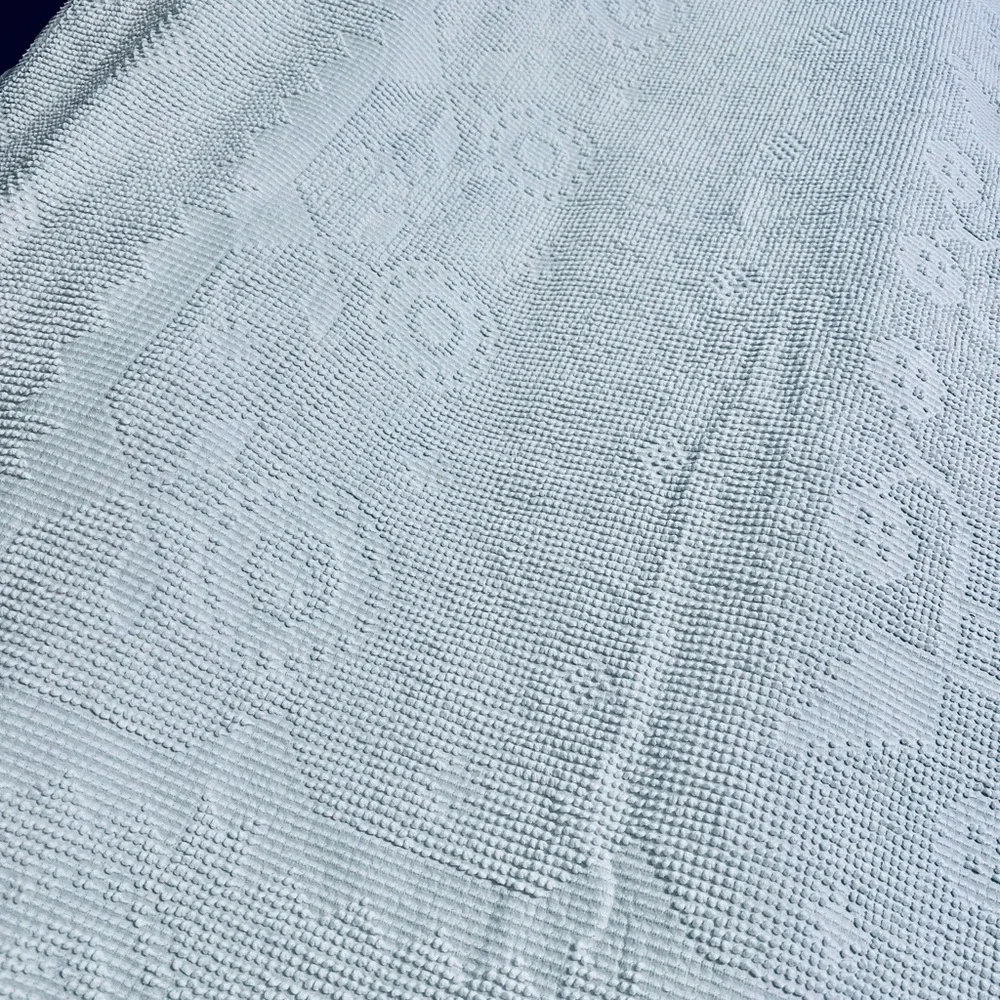 Vintage White Martha Washington Hobnail bedspread.